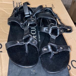Black shoe cult sandals by nasty gal